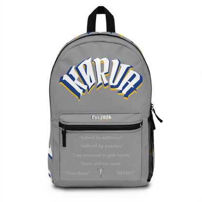 Karua Gray & Gold Logo Backpack — Stylish School & Travel Daypack
